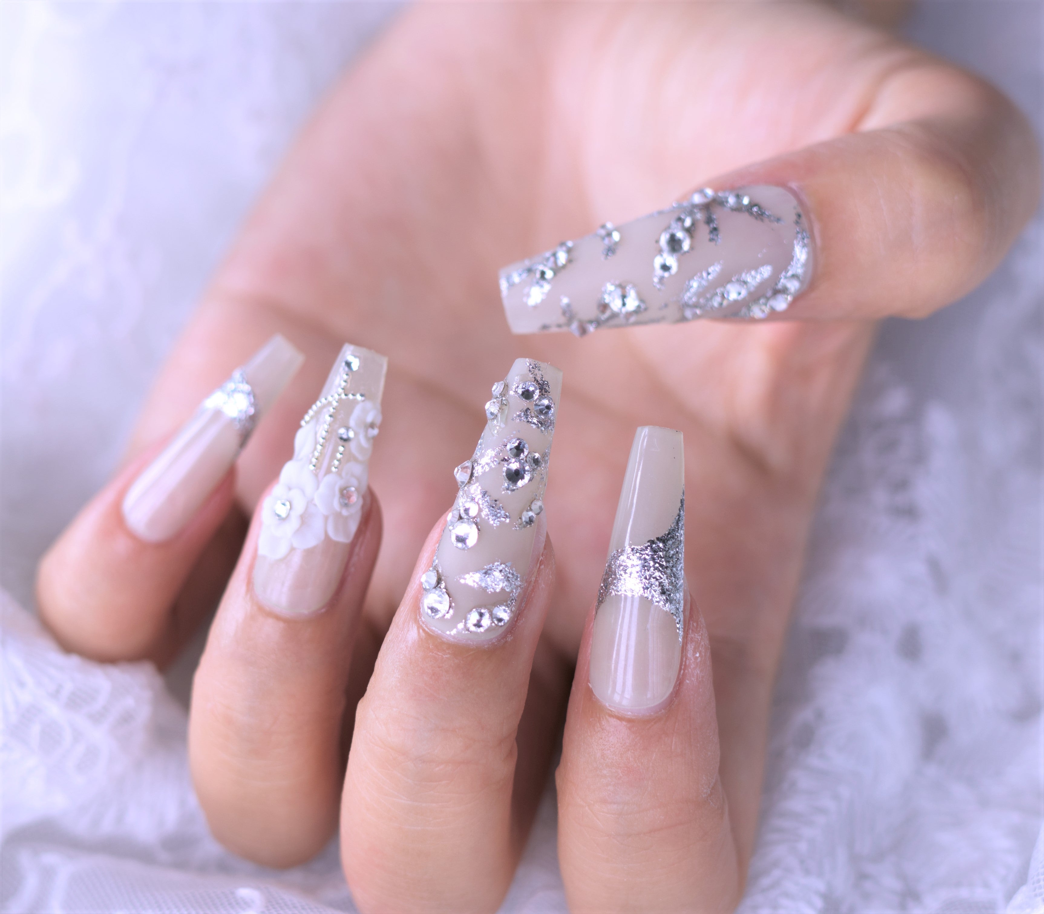 Milky white coffin acrylic nails w/ fairy glitter and rhinestones | White  glitter nails, Long acrylic nails coffin, Gel nails